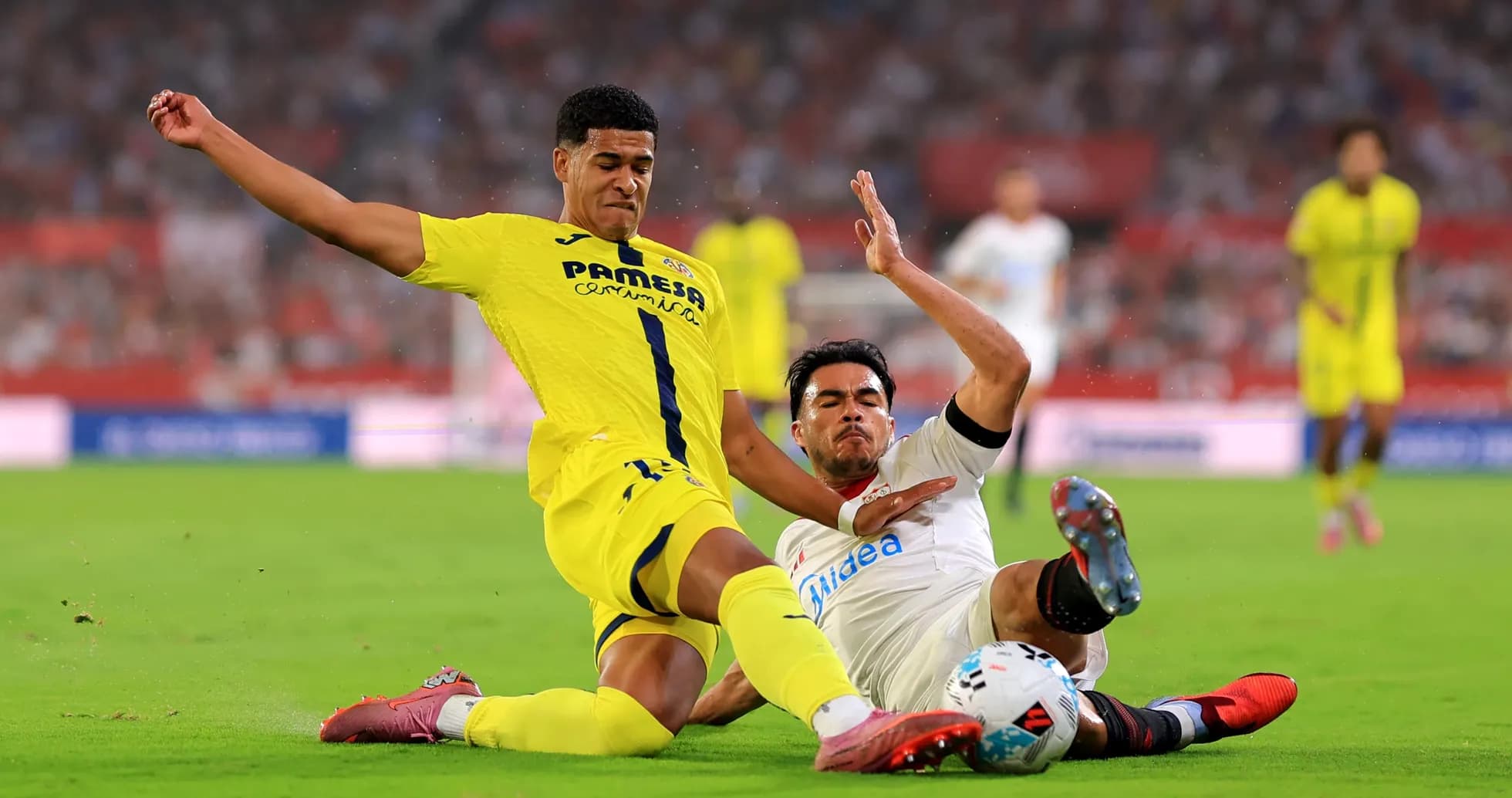 Two players contesting the ball during match