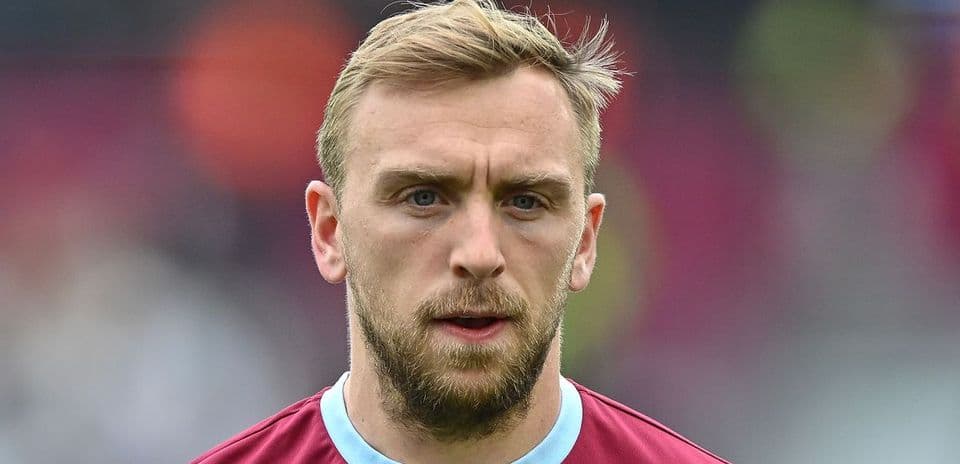 Player in maroon jersey before a match