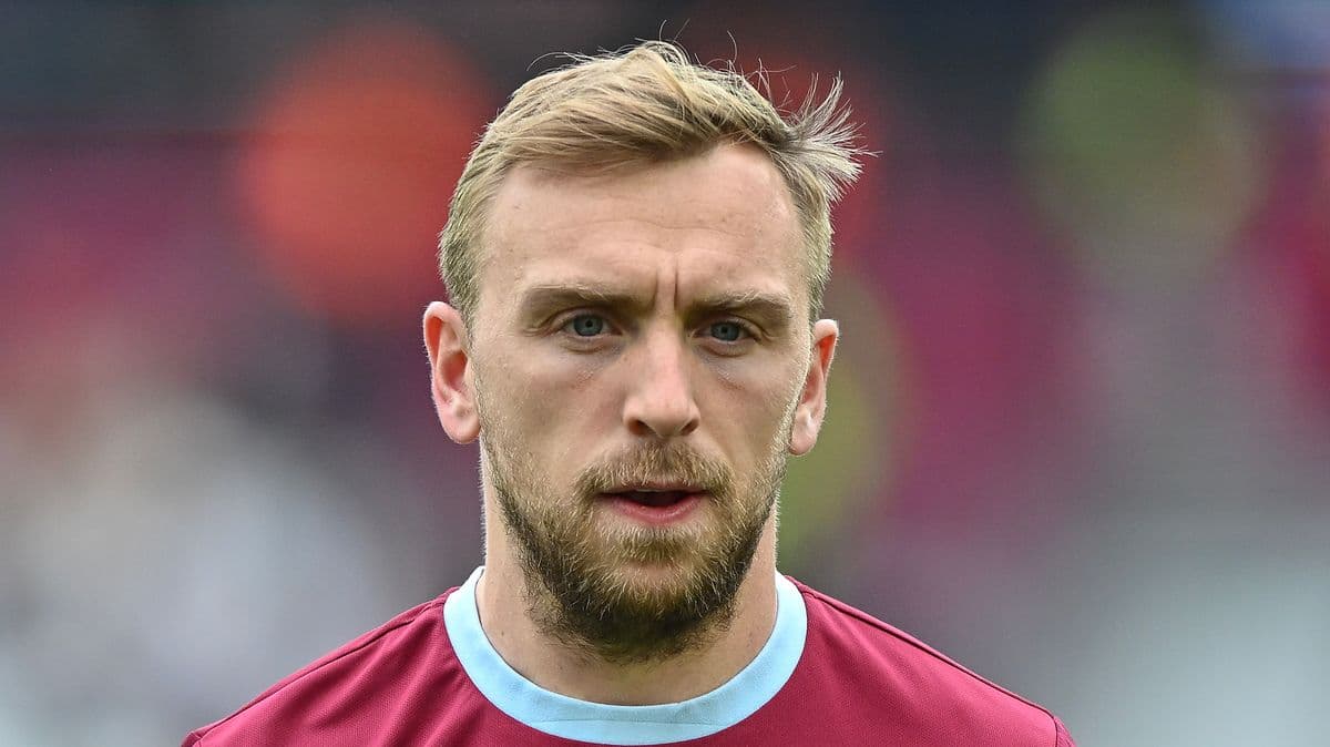 Player in maroon jersey before a match