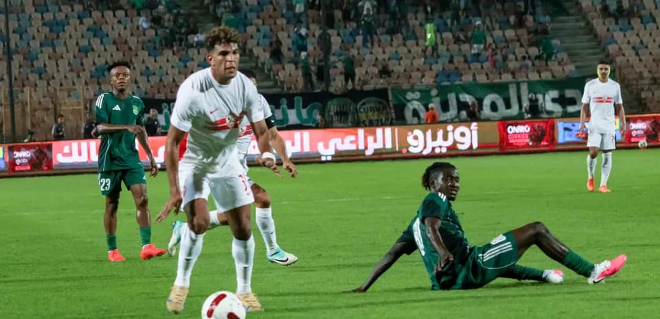 Zamalek SC player in action against Port team