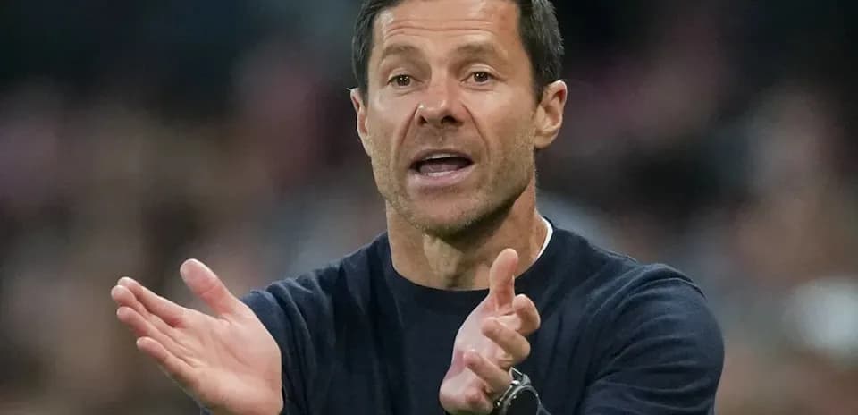 Coach gesturing during a match from the sidelines