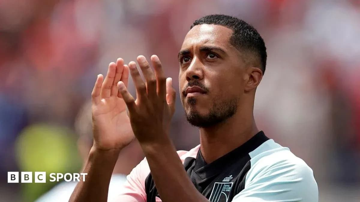 Player applauding fans during a match