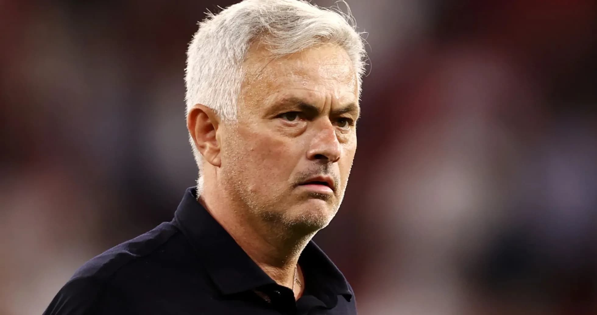 Coach looking on during a match