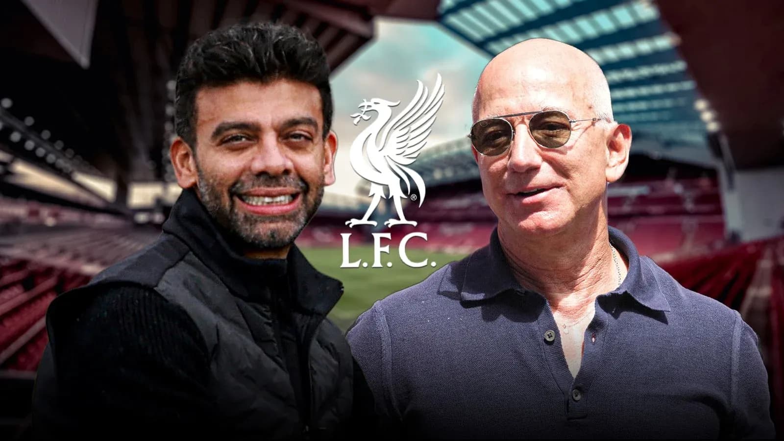 Two men posing at Anfield stadium with LFC logo