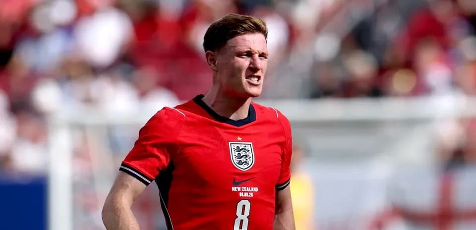 Player in red England kit on the field