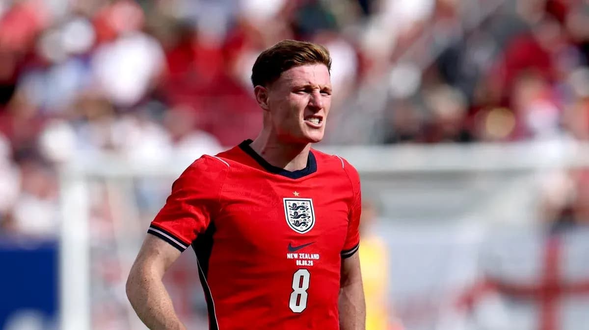 Player in red England kit on the field