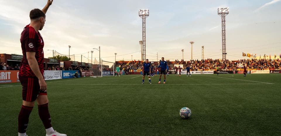 Detroit City player preparing for corner kick