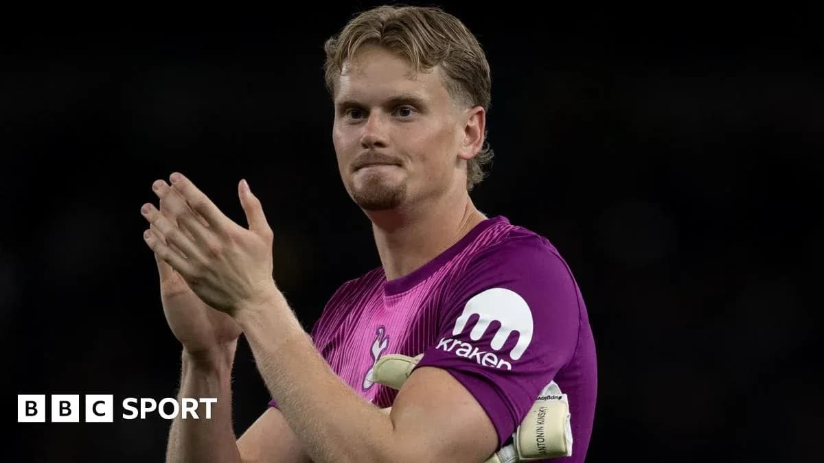 Goalkeeper applauding fans after the match