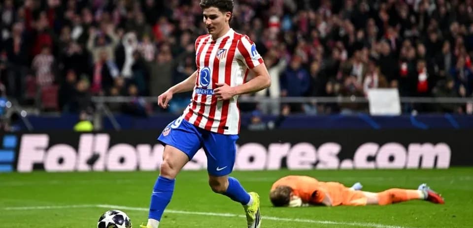 Atletico Madrid player celebrating after scoring a goal