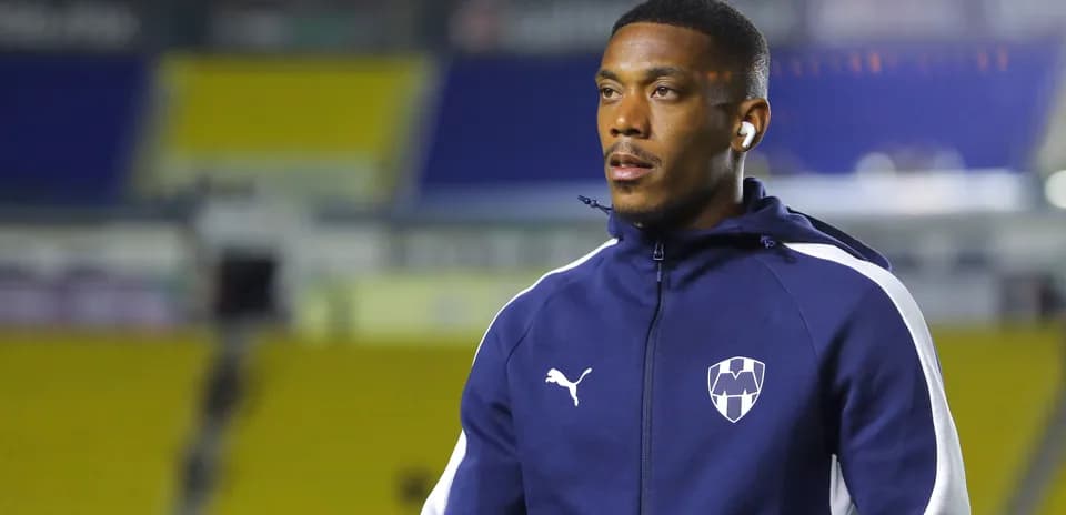 Player wearing team hoodie before the match