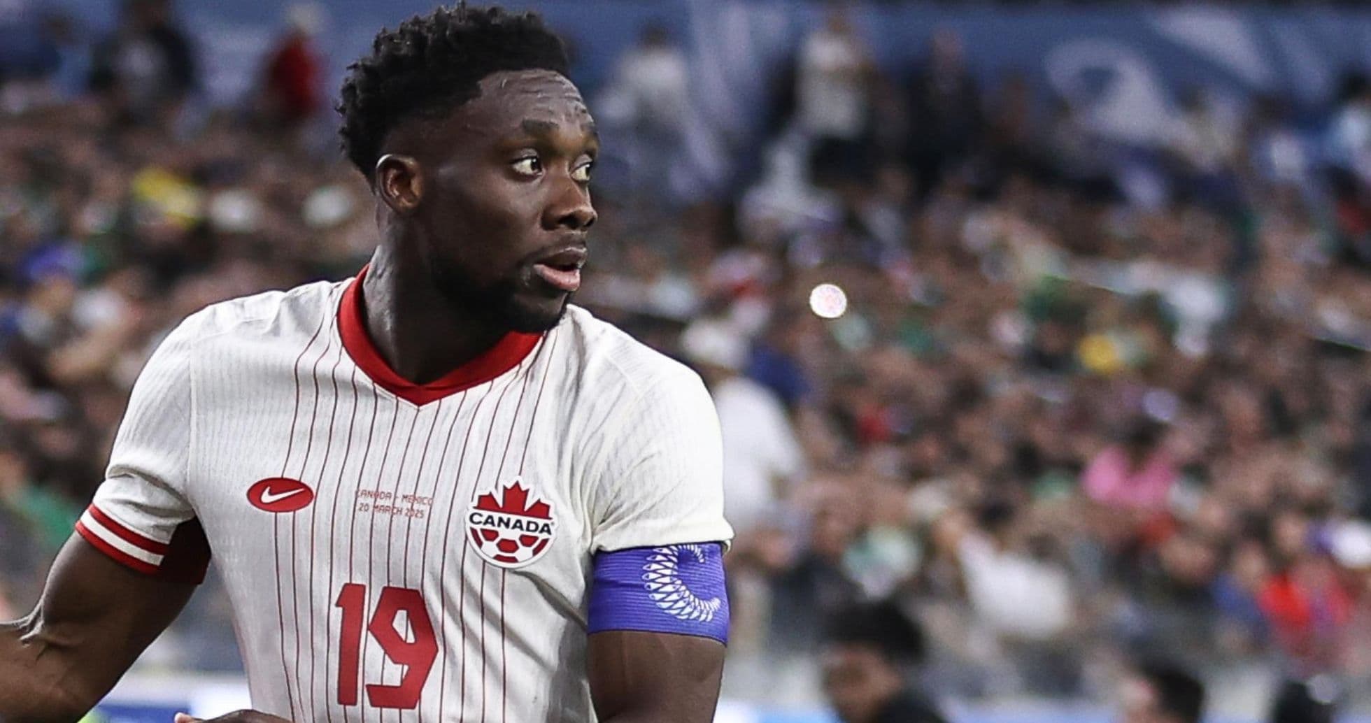 Canada player in action during football match