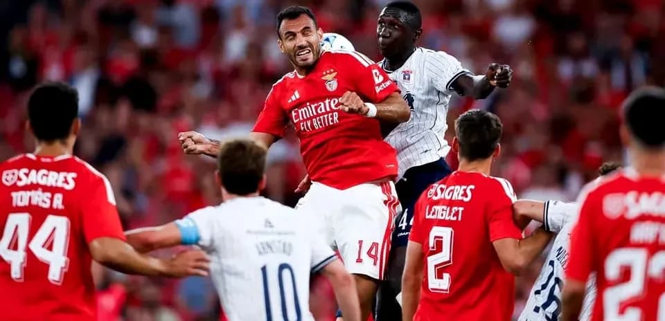 Players competing for the ball during match