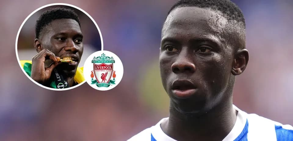 Player in blue jersey during match with Liverpool logo