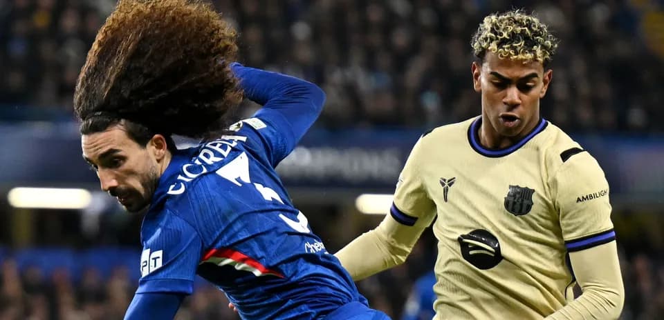 Two players contesting the ball during a match