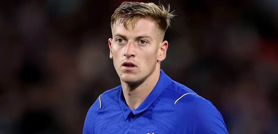 Player wearing blue jersey during match