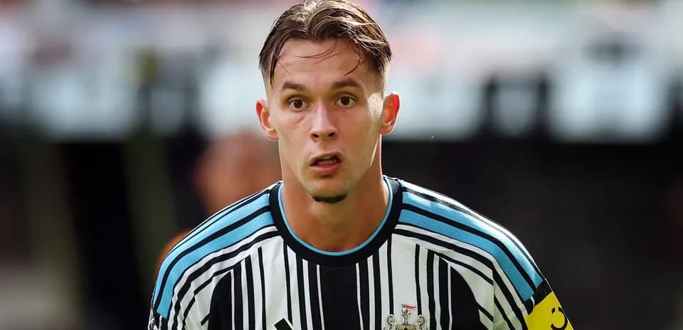 Newcastle United player preparing for play on field