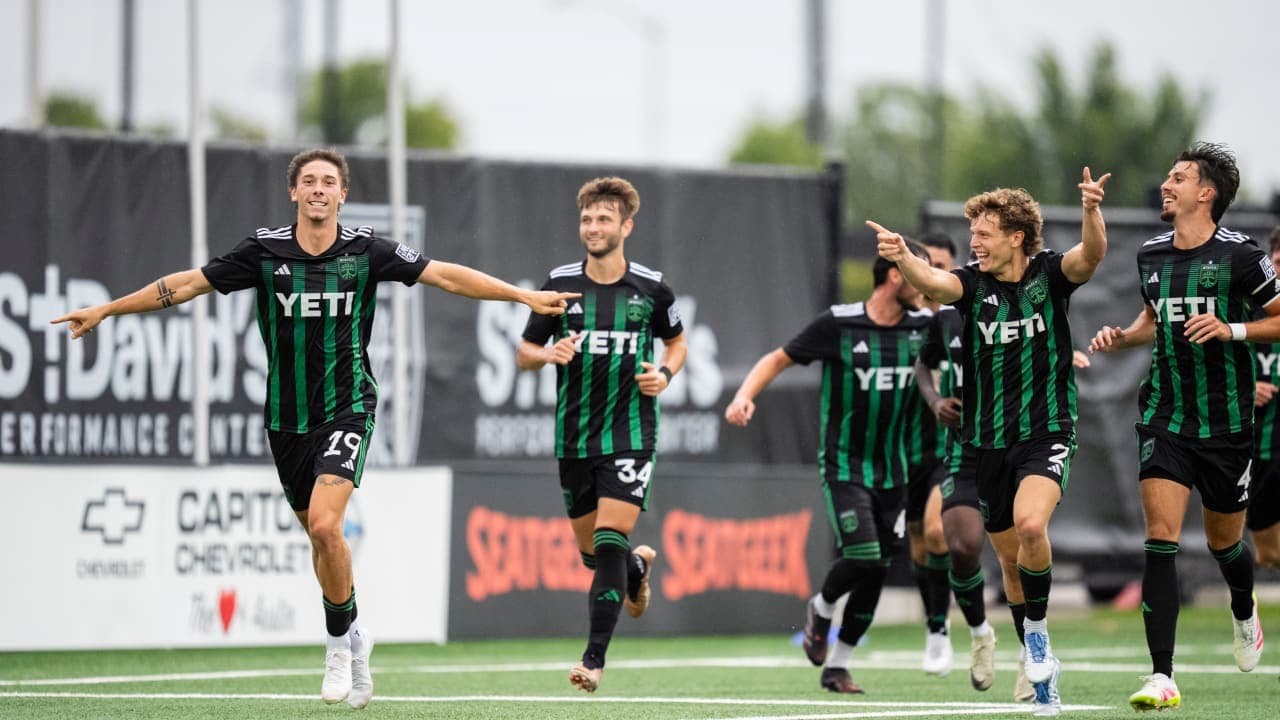 Austin II players celebrating a goal