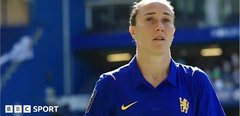 Female player in blue kit on the field