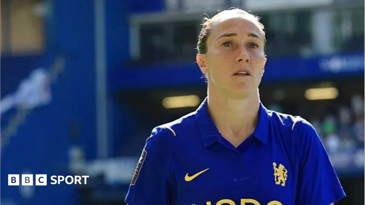 Female player in blue kit on the field