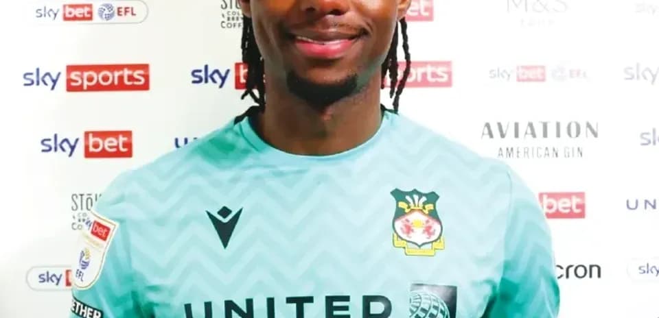 Goalkeeper in team jersey during press event