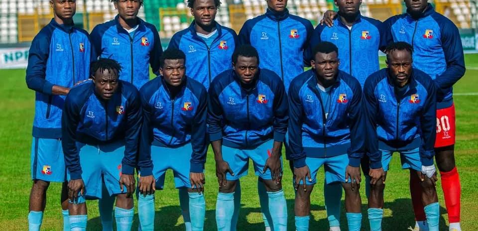 Kano Pillars team posing before the match
