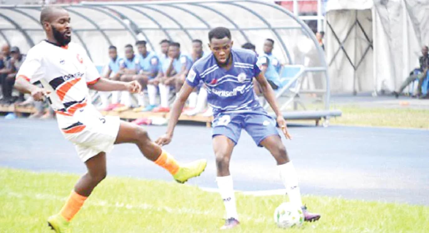 Players competing in Rivers United vs Plateau United match