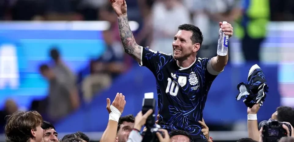 Lionel Messi celebrating with teammates after match