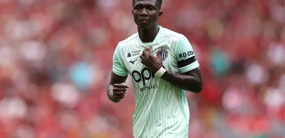 Player in mint green jersey during match action