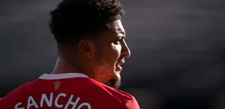 Player wearing red jersey with name SANCHO visible