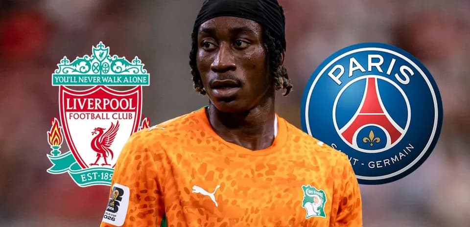 Player in orange jersey with club logos of Liverpool and PSG