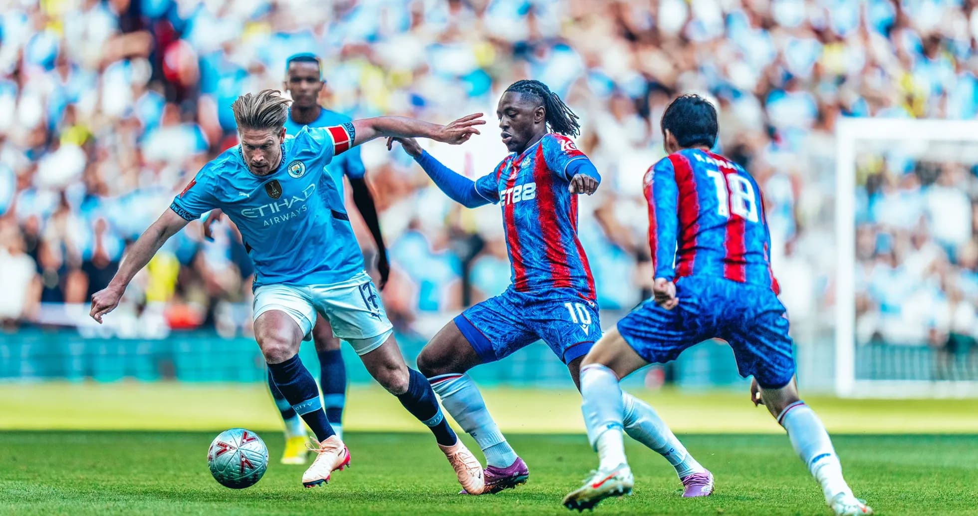Manchester City player challenged by Crystal Palace opponents
