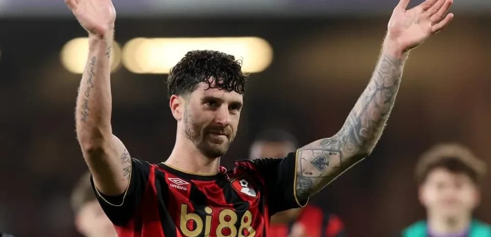 Bournemouth player waving to fans after match