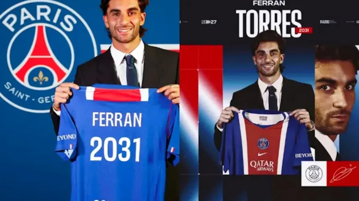 Ferran Torres holding PSG jersey during announcement event