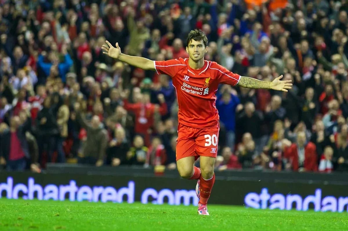 Player celebrating a goal with fans in background