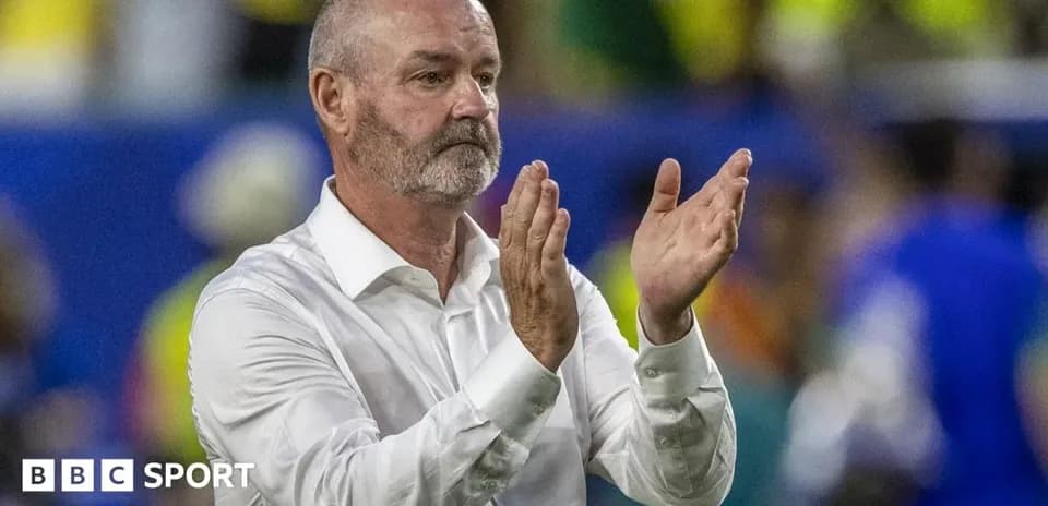 Coach applauding during a match on the sidelines