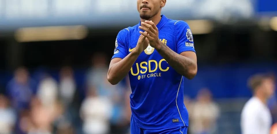 Chelsea player applauding fans at the stadium