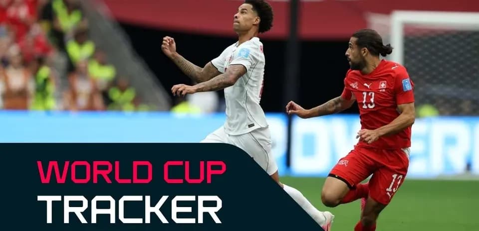 Players competing for the ball during World Cup match