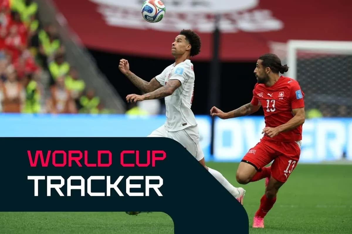Players competing for the ball during World Cup match