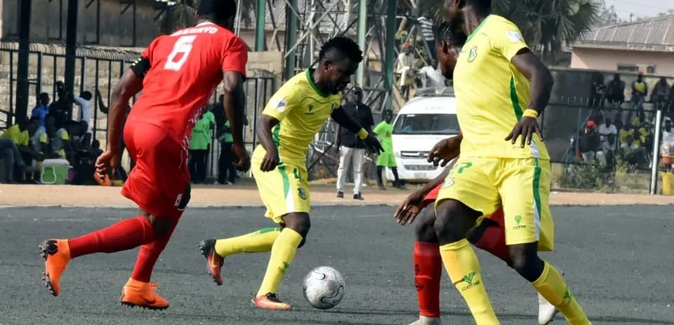 Kwara United players in action against Kano Pillars