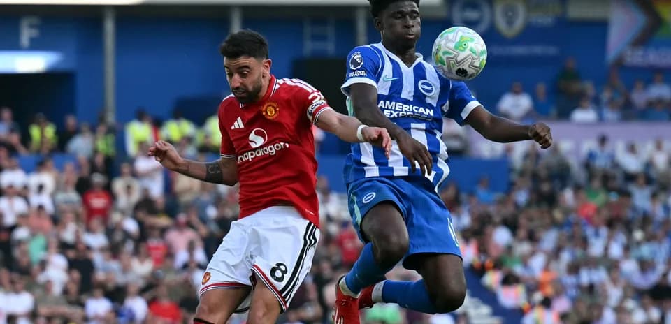 Player from Manchester United and Brighton contesting the ball