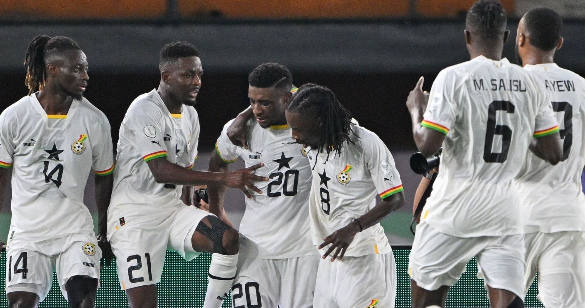 Ghana players celebrating a goal during match