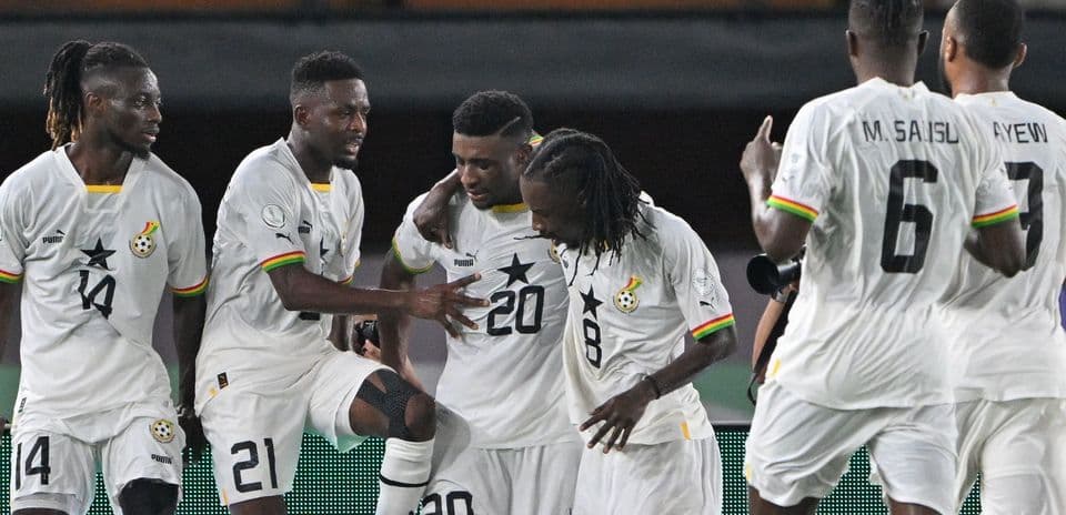 Ghana players celebrating a goal during match