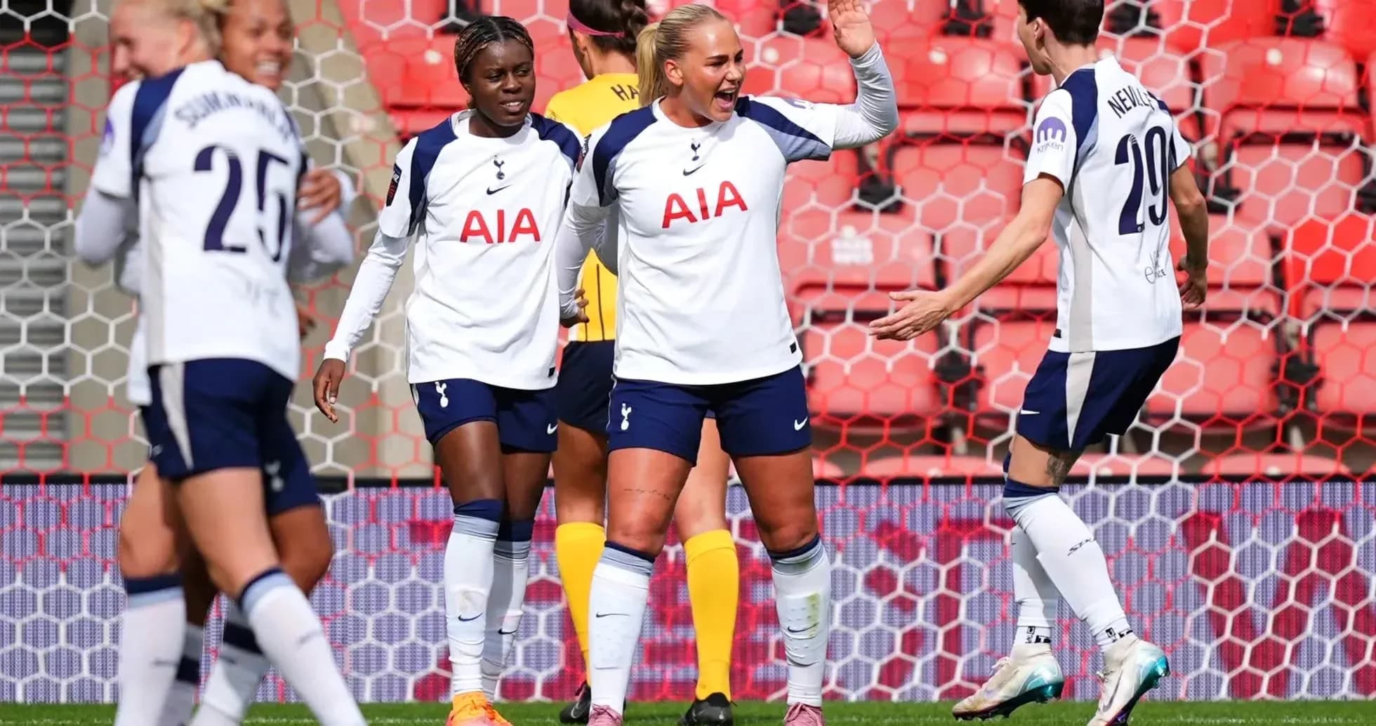 Tottenham players celebrating a goal during match