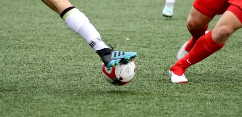 Players contesting for the ball in WK-League match