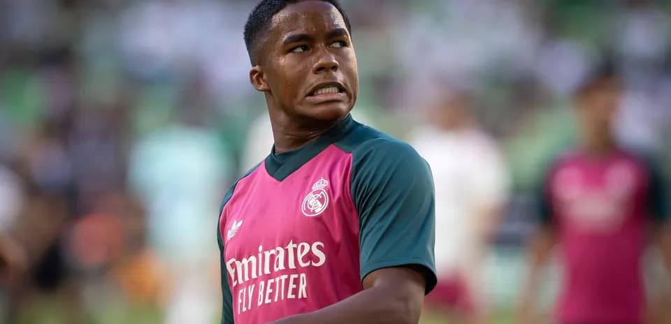 Player in Real Madrid training kit on field