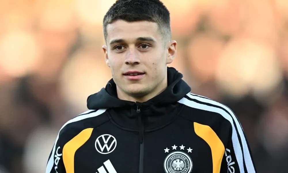 Player wearing Germany team jacket during warm-up