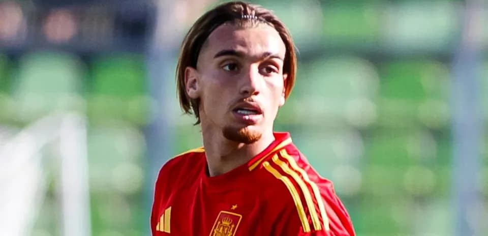 Player in Spain national team jersey on the field