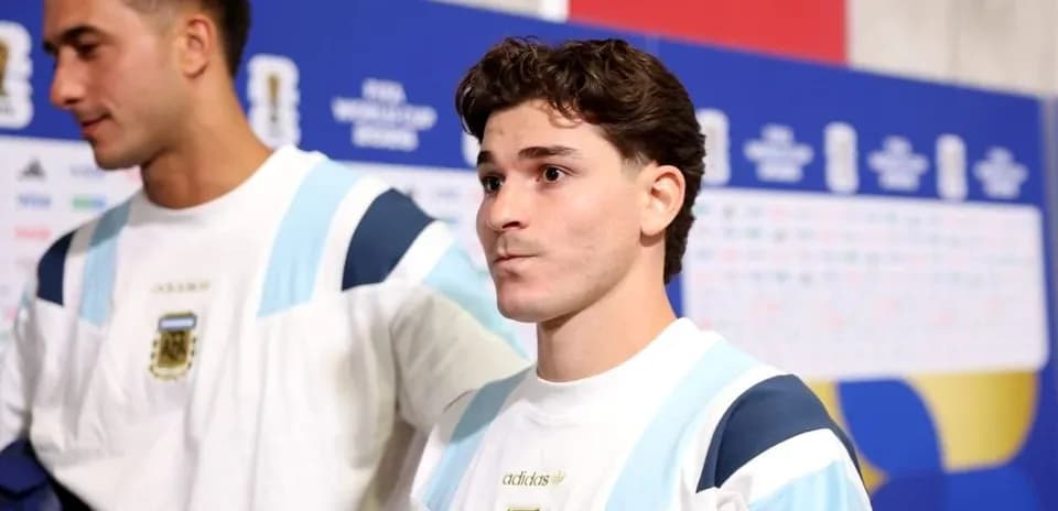Two players in Argentina jerseys before a match
