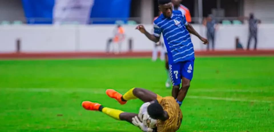 Player tackling goalkeeper during NPFL match