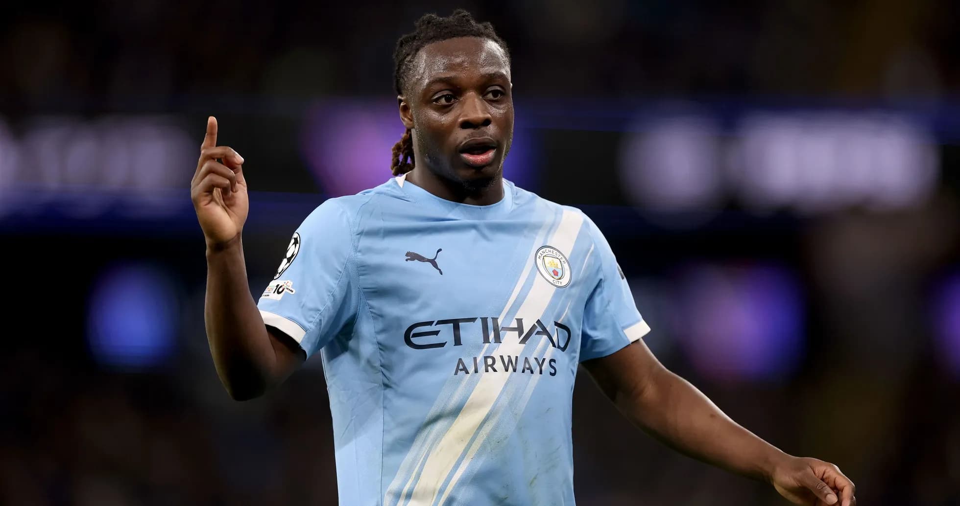 Player gesturing during Manchester City match